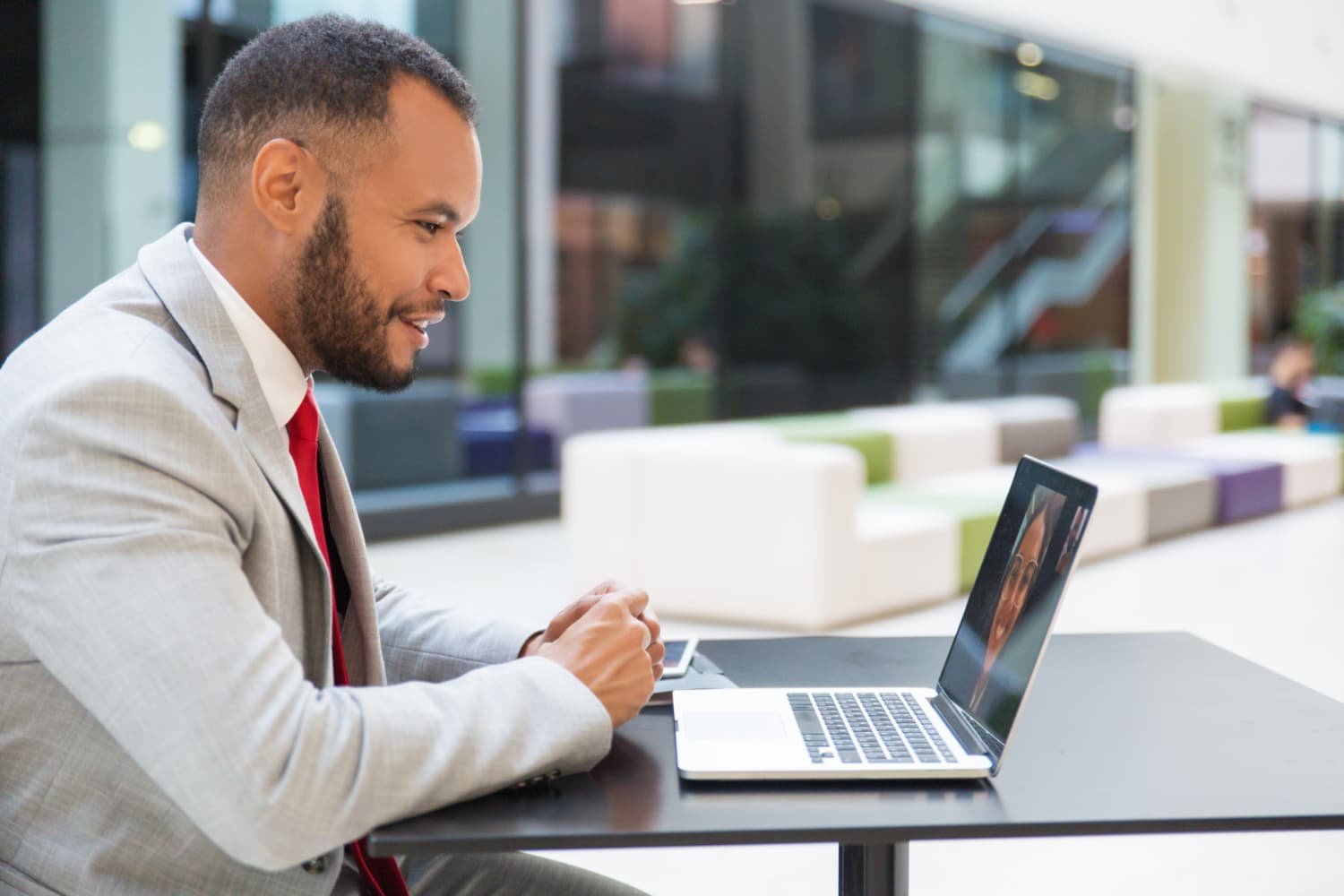 image of a man working on a computer